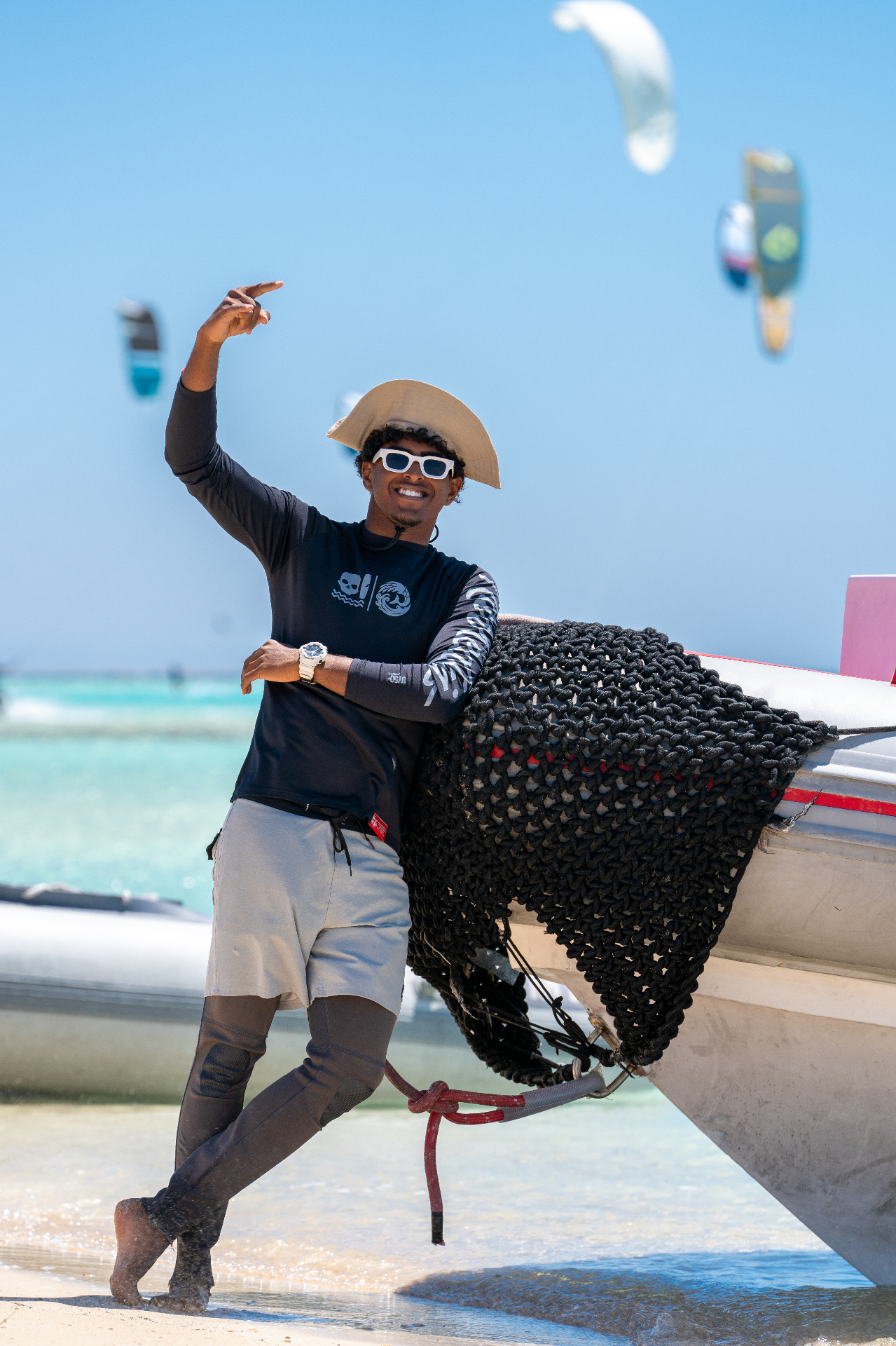 Smiling kite instructor on the beach