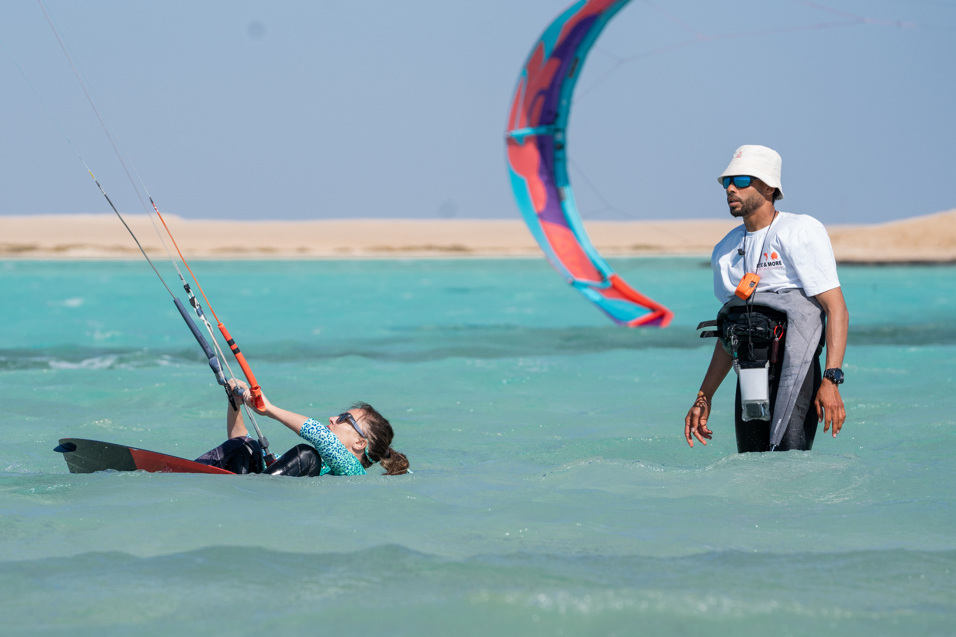 Kitesurf lesson in shallow turquoise water during the safari