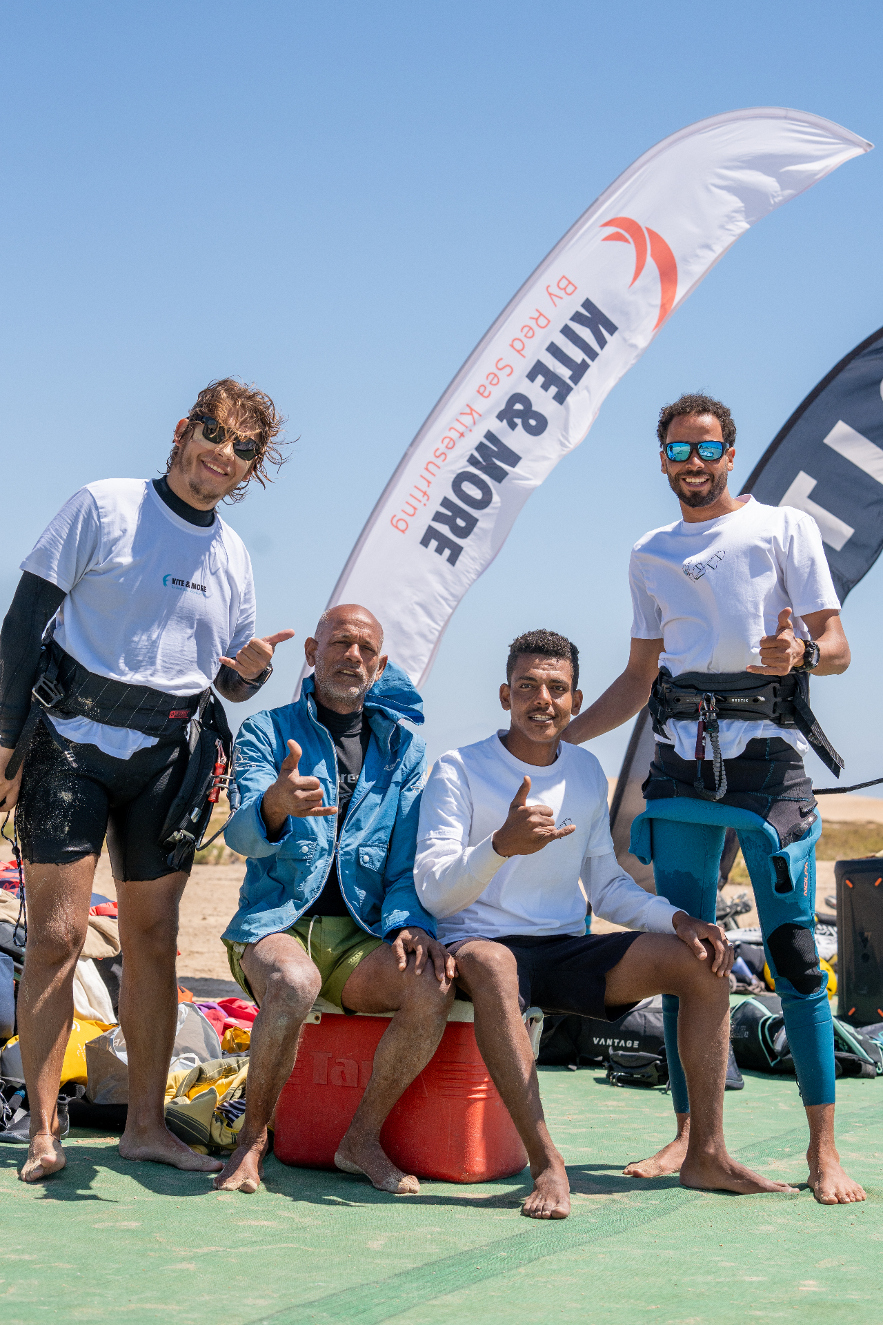 Kite & More instructors with the team flag
